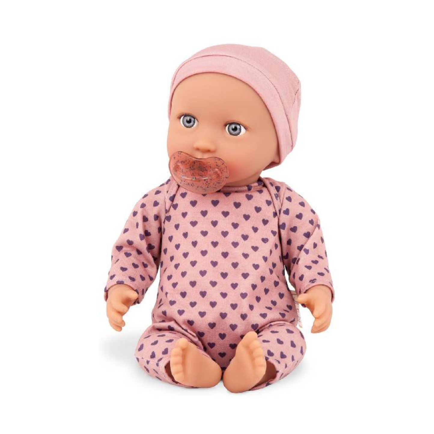 Muñeca con pijama rosa con corazones y gorro