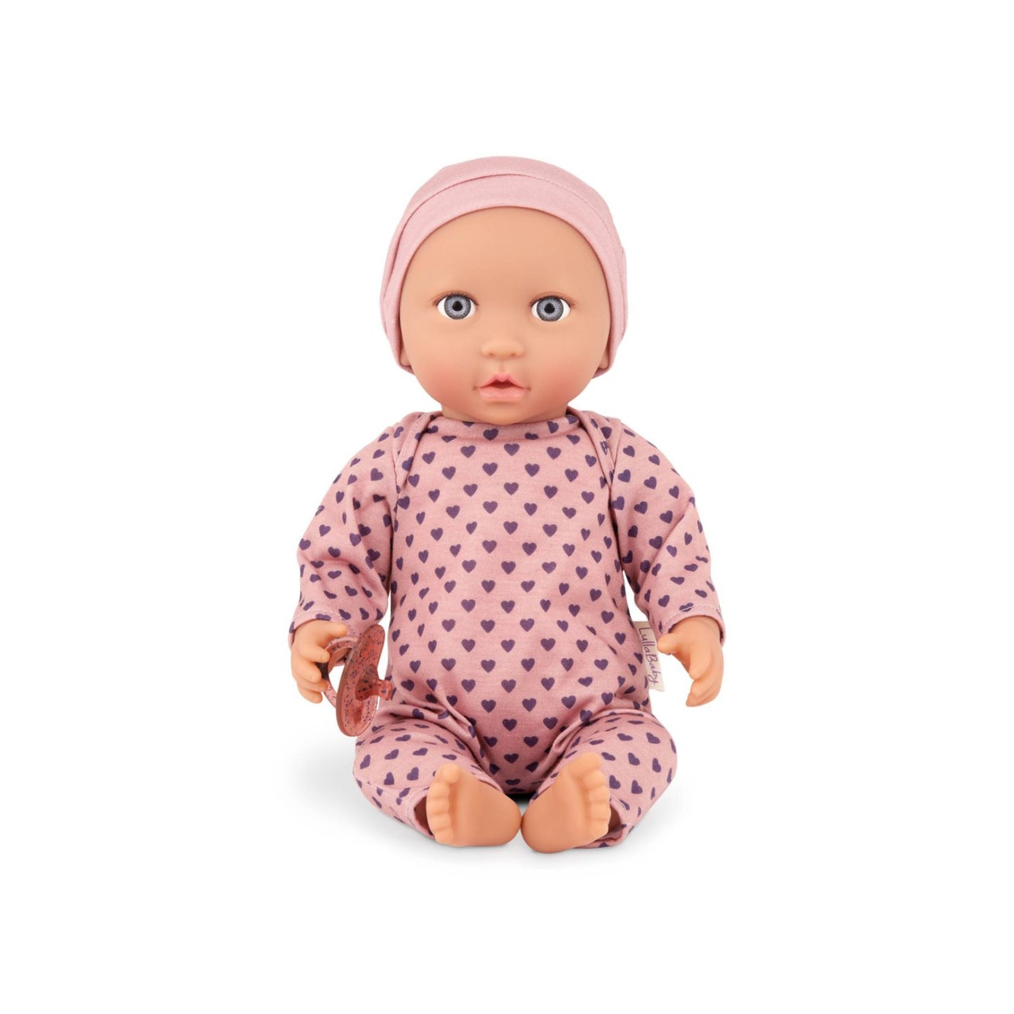 Muñeca con pijama rosa con corazones y gorro