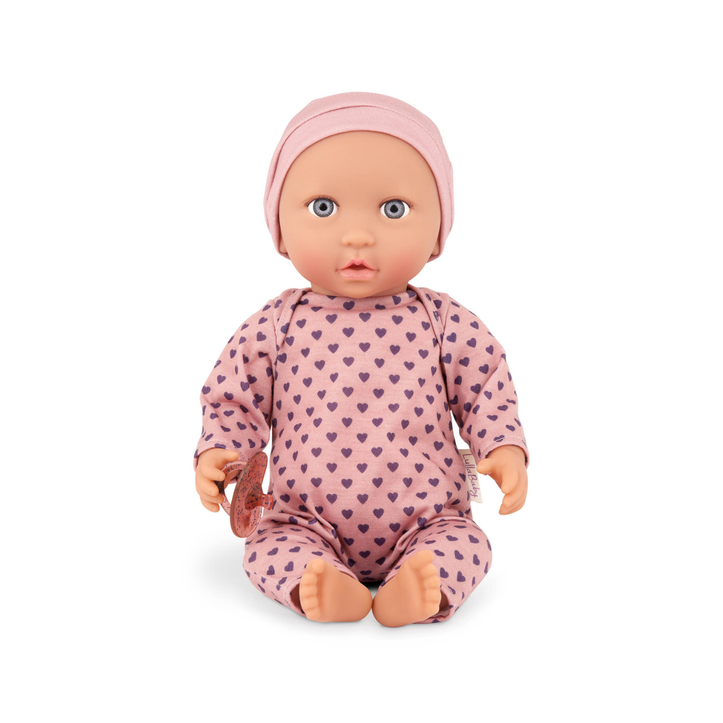 Muñeca con pijama rosa con corazones y gorro