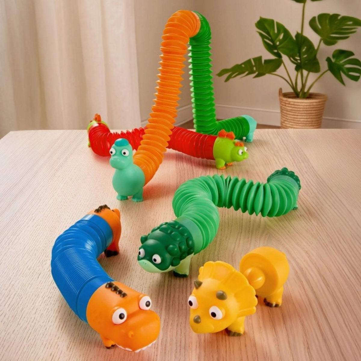 Set sensorial de tubos temáticos de dinosaurios (Mix & Match)